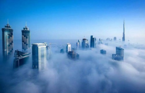 Dubai Skyline Above The Cloud