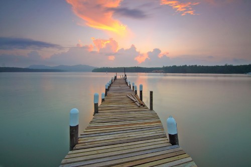 A beautiful view of sunset and wooden bridge