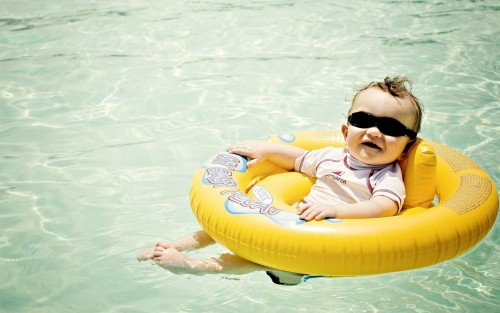Baby happy in swim suit