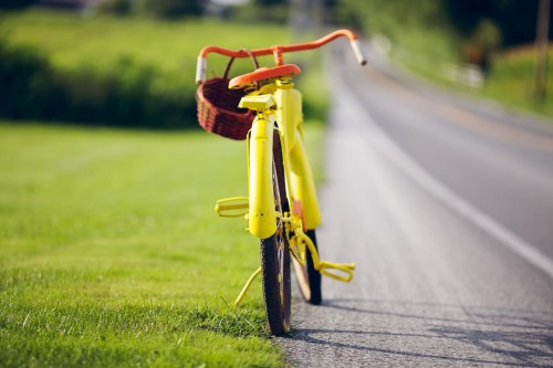 Yellow bicycle on road