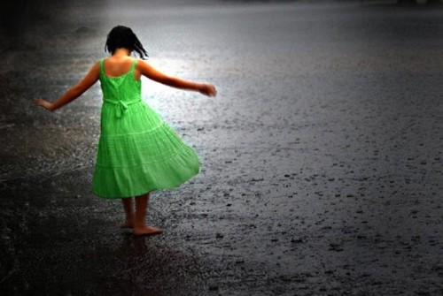 Girl enjoying the rain