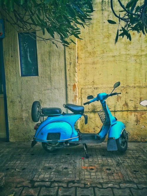 Old teal motor scooter