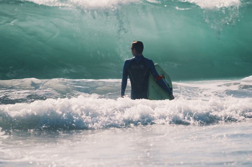 Surfer Board On Waves