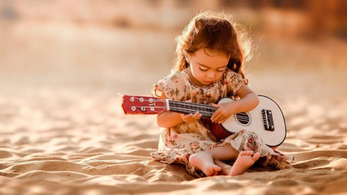Little Cute Guitarist Girl