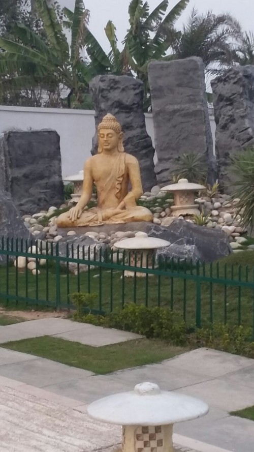 Mahatma Budha's statue in Japanese garden.