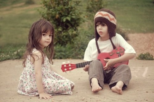 Babies Playing with Guitar