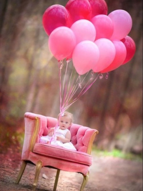 Baby Girl Playing With Balloons