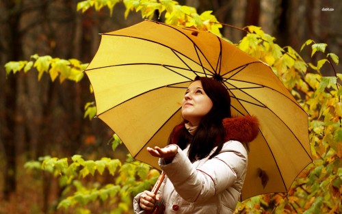 Girl with a yellow umbrella
