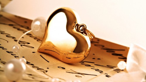 Golden heart and love letter