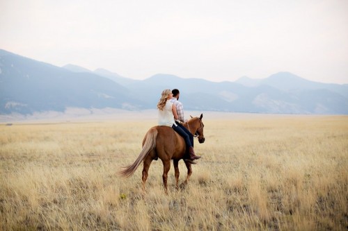 Couple Riding Horse