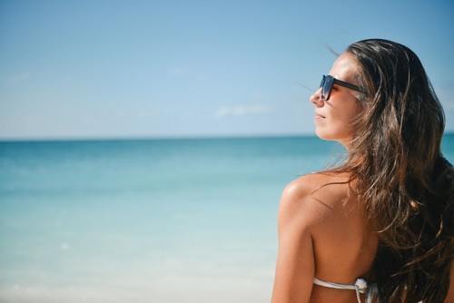 Girl enjoying the summer in beach