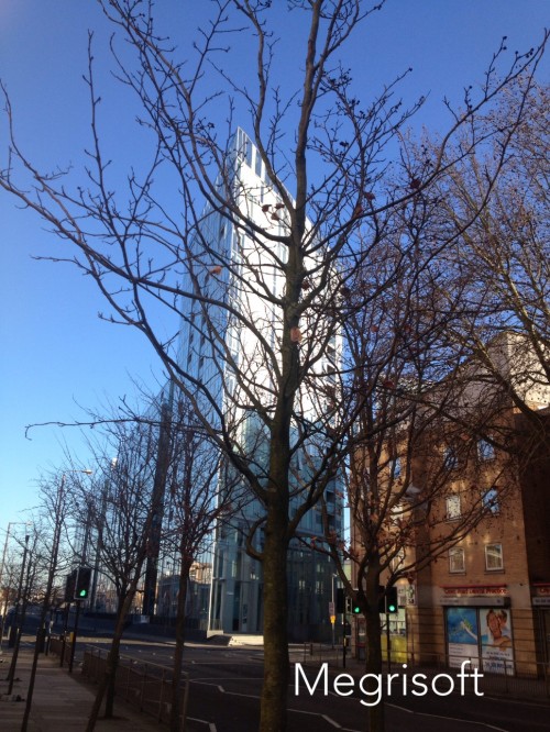 South east London , Creek road , Deptford se8. You can see tall building, winter season, tree, road and blue sky